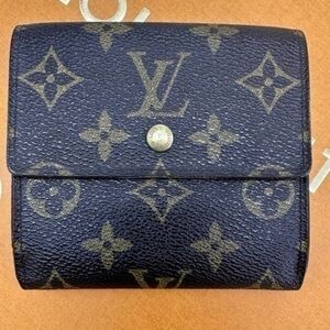 AUTHENTIC Louis Vuitton Vintage Compact Elise wallet.